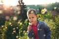Boy blowing dandelion seeds in outdoor Royalty Free Stock Photo