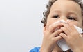 Boy blowing nose stock photo Royalty Free Stock Photo