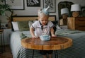 Boy blowing out a candle on a birthday cake Royalty Free Stock Photo