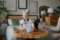 Boy blowing out a candle on a birthday cake Royalty Free Stock Photo