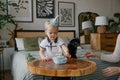 Boy blowing out a candle on a birthday cake Royalty Free Stock Photo