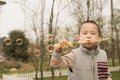 Boy blowing soapbubbles