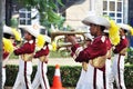 Boy blowing trumpet in marching band festival Royalty Free Stock Photo