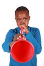 Boy Blowing Vuvuzela Royalty Free Stock Photo