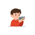 Boy blowing whistle with focused expression in red shirt vector illustration Royalty Free Stock Photo