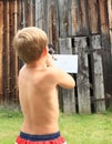 Boy with blowpipe Royalty Free Stock Photo