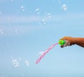 The boy blows bubbles Royalty Free Stock Photo
