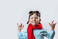 Boy in blue shirt, red scarf, biker glasses and bandana on light background Royalty Free Stock Photo