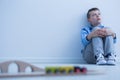 Boy starring at wall