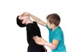 Boy in blue T-shirt holds reception against the boy in a black T-shirt