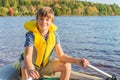 Boy in a boat in water