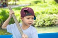 The boy boating in the park. Royalty Free Stock Photo