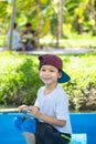 The boy boating in the park. Royalty Free Stock Photo