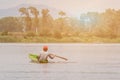 Boy boating in river in middle day. Royalty Free Stock Photo