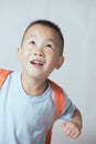 Boy with book bag Royalty Free Stock Photo