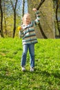 Boy with a bouquet of dandelions Royalty Free Stock Photo