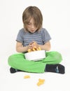 Boy with bowl full of peanut flips