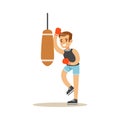 Boy Boxing With Punch Bag, Kid Practicing Different Sports And Physical Activities In Physical Education Class Royalty Free Stock Photo