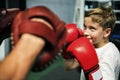 Boy Boxing Training Punch Mitts Exercise Concept