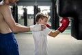 Boy Boxing Training Punching Bag Exercise Concept Royalty Free Stock Photo
