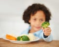 Boy, broccoli and vegetables plate unhappy for healthy nutrition meal, diner fail or frustrated eating. Male, kid and Royalty Free Stock Photo
