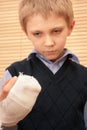 Boy with broken hand. Royalty Free Stock Photo