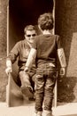 Boy and brother playing on the playground Royalty Free Stock Photo