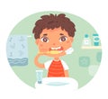 Boy brushing teeth standing near sink with tap in bathroom. Everyday mouth hygiene routine. Cartoon child character Royalty Free Stock Photo