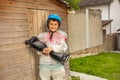 Boy bubble wrap overprotective with hoverboard in hands