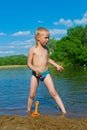 Boy builds a sand Royalty Free Stock Photo