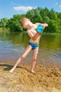 Boy builds a sand