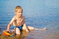 Boy builds a sand