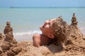 Boy buried in sand Royalty Free Stock Photo