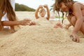 Boy Buried In Sand On Beach. Mother And Little Sister Playing On Coast. Family Enjoying Summer At Tropical Resort. Royalty Free Stock Photo