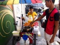 A boy buys kwek-kwek a local delicacy from a street food vendor in Antipolo