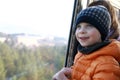 Boy in cabin of cableway Royalty Free Stock Photo