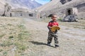 Boy with cake in Tajikistan