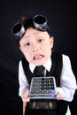 Boy with calculator Royalty Free Stock Photo