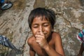 Boy in a Cambodian fishing village