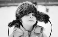 Boy in a cap with earflaps Royalty Free Stock Photo