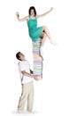 Boy carrying girl on book stack. Royalty Free Stock Photo