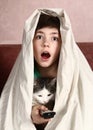 Boy with cat watch horror movie Royalty Free Stock Photo