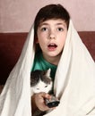 Boy with cat watch horror movie Royalty Free Stock Photo