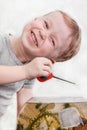 Boy catches fish in aquarium Royalty Free Stock Photo