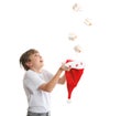 Boy catching Christmas present Royalty Free Stock Photo