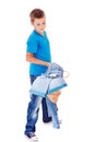 Boy catching denim clothes Royalty Free Stock Photo