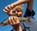 Boy caught grayling Royalty Free Stock Photo