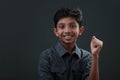 Boy with a cheering expression Royalty Free Stock Photo