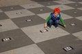 Boy and chessboard