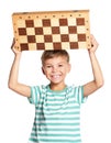 Boy with chessboard Royalty Free Stock Photo